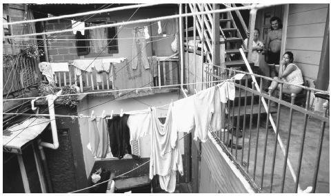 Laundry hanging above a courtyard in La Boca, a working-class neighborhood in Buenos Aires. The economic crises of the 1980s and 1990s caused many middle-class citizens to experience downward mobility.