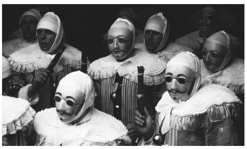 The three-day carnival at Binche, near Mons, is held just before  Lent. During the Gilles carnival men dressed in bright costumes lead  participants. The majority of Belgians are Catholic.