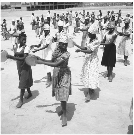 A number of female students at a college in Kinshasa, learning dance. There are four universities located in the Congo.