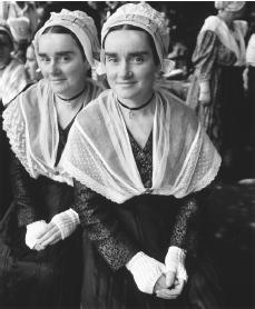 Breton girls in costumes for a festival. Each commune generally  holds a festival during the year.
