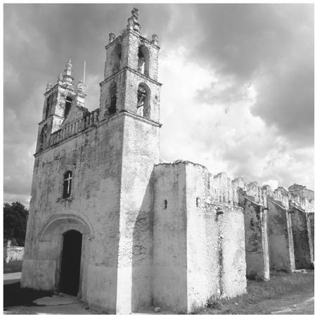 This colonial church with two bell towers was built with ancient  Maya stones. Spanish and French architectural traditions influenced  Mexican buildings.