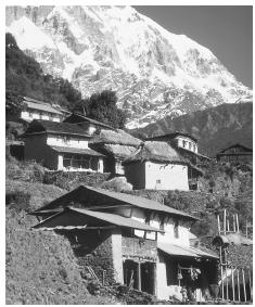 The village of Siklis, in the Himalayas. Village houses are usually clustered in river valleys or along ridge tops.