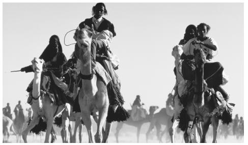 Tuareg camel-riders, Tamazlak. The Tuareg form 10 percent of the population.