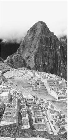 Remaining structures of the ruined city of Machu Picchu, built by  the Incas in the Andes.