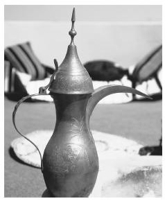 An Arabian coffee pot.