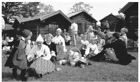 A mid-summer festival featuring traditional Swedish dress and activities.