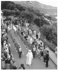 A procession heading to the National Eisteddfod Festival in Llandudno, Wales.
