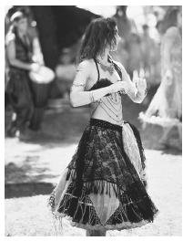 This gypsy woman is participating in a traditional dance.