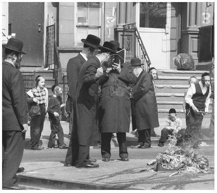 Orthodox Jews burn hametz in preparation for Passover in the Williamsburg section of New York. Hametz, or leavened foods, are not permitted to be eaten during Passover.
