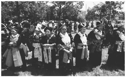 Laotian tribeswomen gather near the Vietnam Veterans Memorial in Washington, D.C.