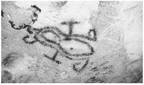 A petroglyph on a cave in the inland desert of Aruba.
