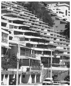 Chile's mountainous regions force architects to be creative, as these apartments built into a hillside in Renaca show.