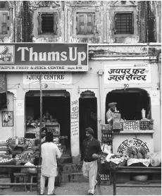 Indian shop workers in the main bazaar in Jaipur, Rajasthan.