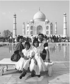 A family at the Taj Mahal, one of the most famous buildings in the world.