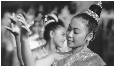 A Laotian dancer performs at Pha That Luang, the country's largest Buddhist Stupa, during the That Luang, or "Full Moon," Festival.