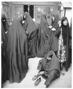 Women outside a mosque in Damascus. Religion is an important part of daily life in Syria.