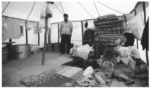 A Bedouin family in their tent in the Syrian Desert. The nomadic people live primarily in southern and eastern Syria.