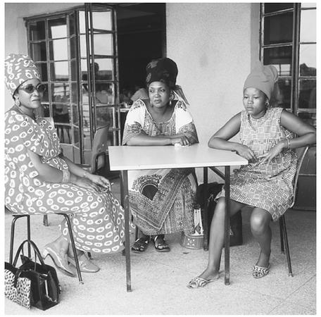 Three women relax in Tanzania. Successful women from ruling families enjoy many of the same privileges as men.