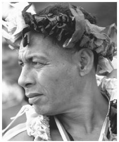 A Polynesian man wears a traditional costume at a ceremony on Tuvalu Island.