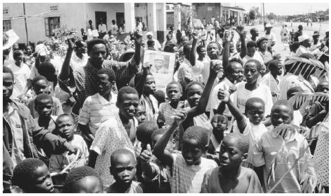 The people of Kalunga village celebrate the victory of Kintu Musoke in the 1994 nonpartisan general election in Uganda.
