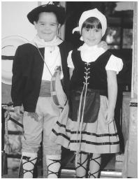 These young Basque American children are dressed traditionally to perform at a town celebration.