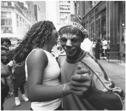 Michelle Jesus and Adenilson Daros enjoy dancing together at the 1998 New York Brazil Street Festival.