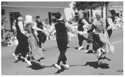 These Dutch Americans are performing in the 1985 Tulip Festival, an annual event that takes place in Holland, Michigan.