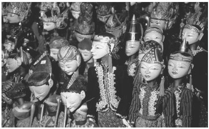 This is a collection of traditional Indonesian wajang golek puppets.