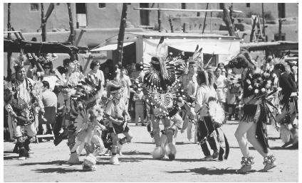 These Pueblo children are performing in a ritual cermonial dance.