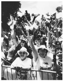 These enthusiastic spectators are watching the 1990 Puerto Rican Day Parade in New York City.